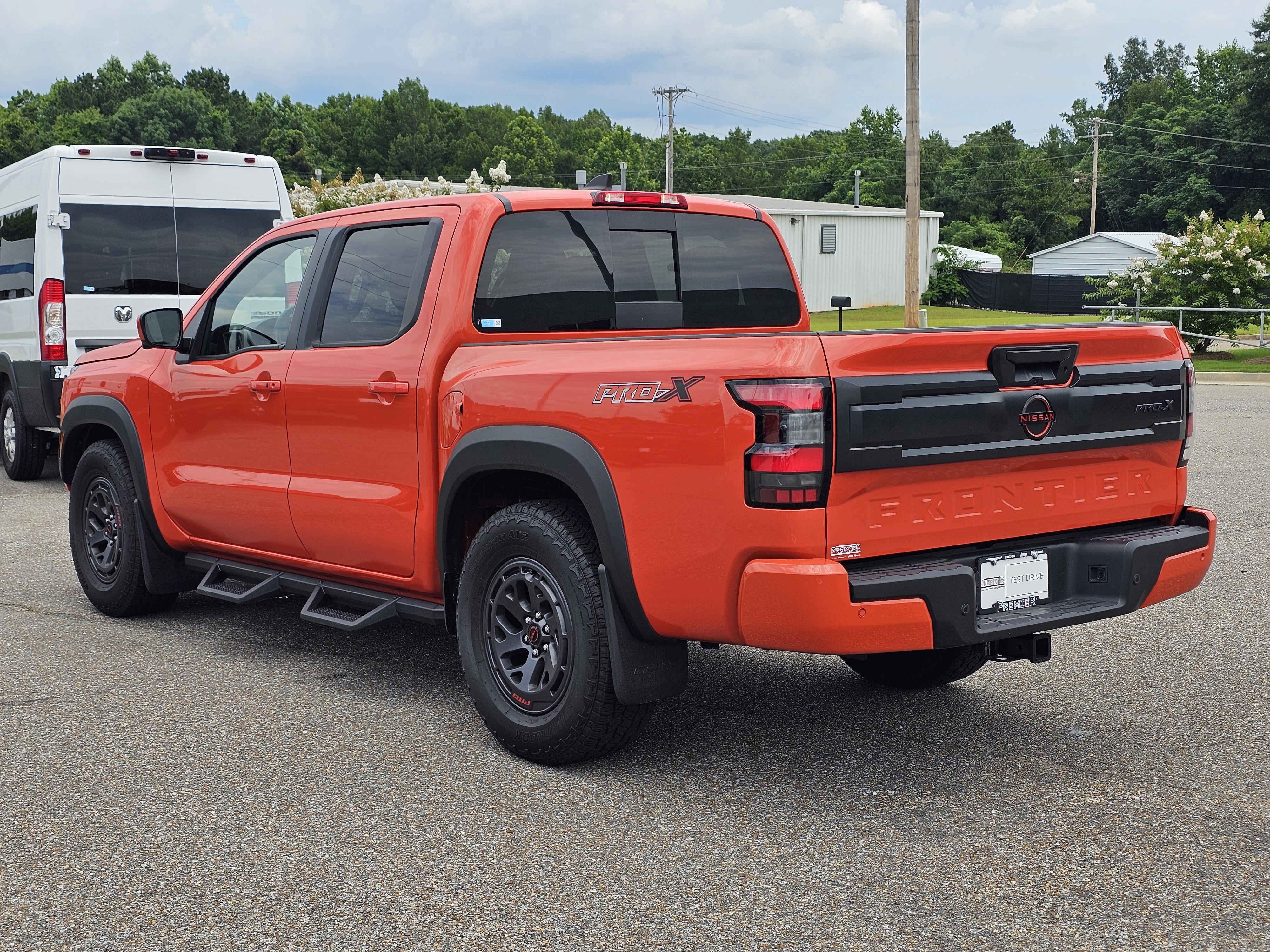 Used 2025 Afterburn Orange Nissan PRO-X image 13