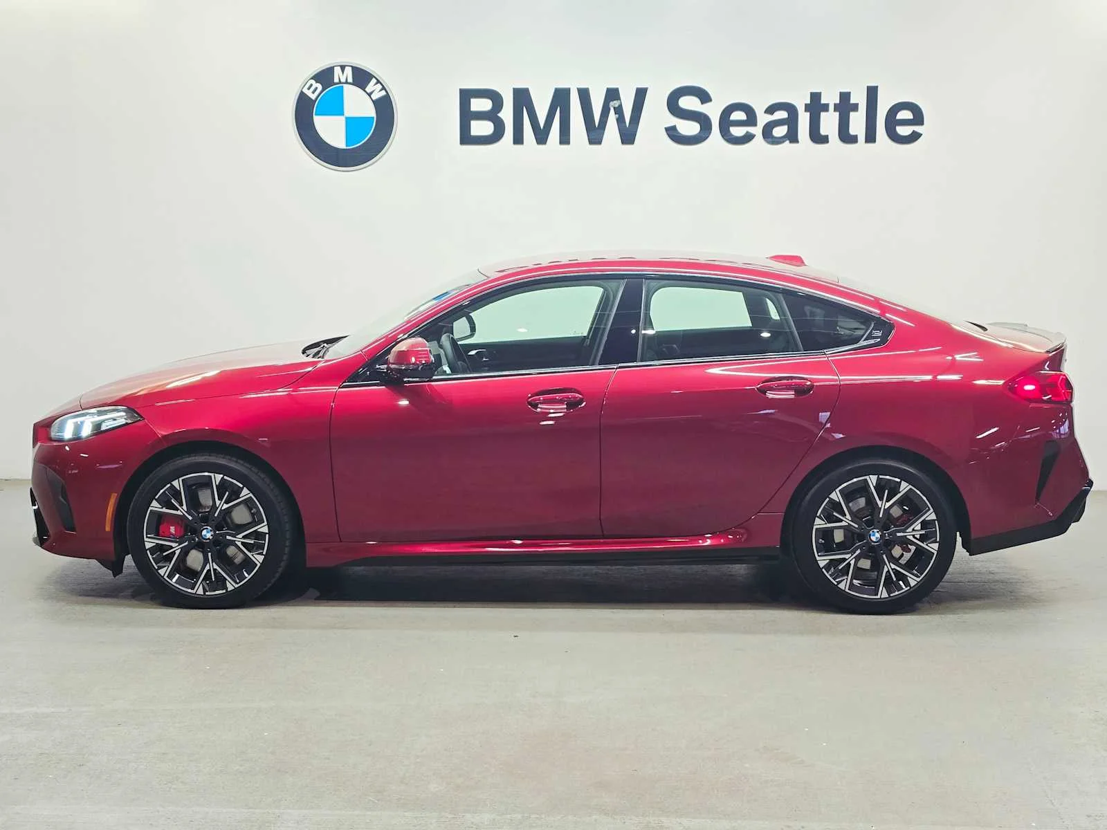 Certified Used 2025 Vegas Red Metallic BMW 228 xDrive image 3