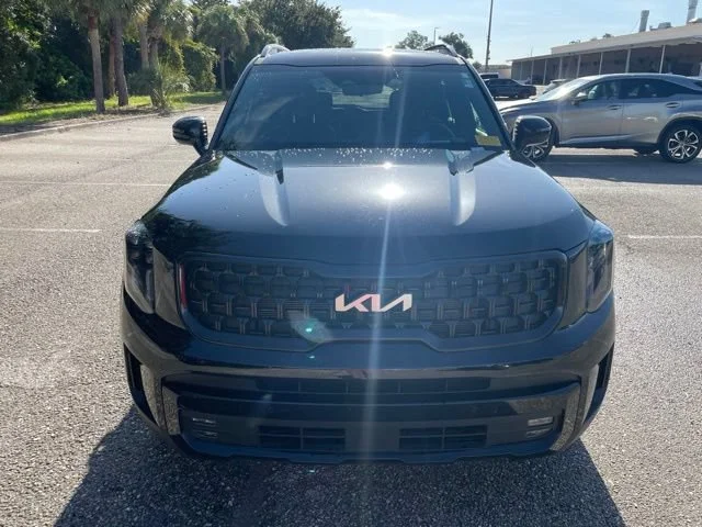 Used 2024 Ebony Black Kia SX Prestige X-Line image 6