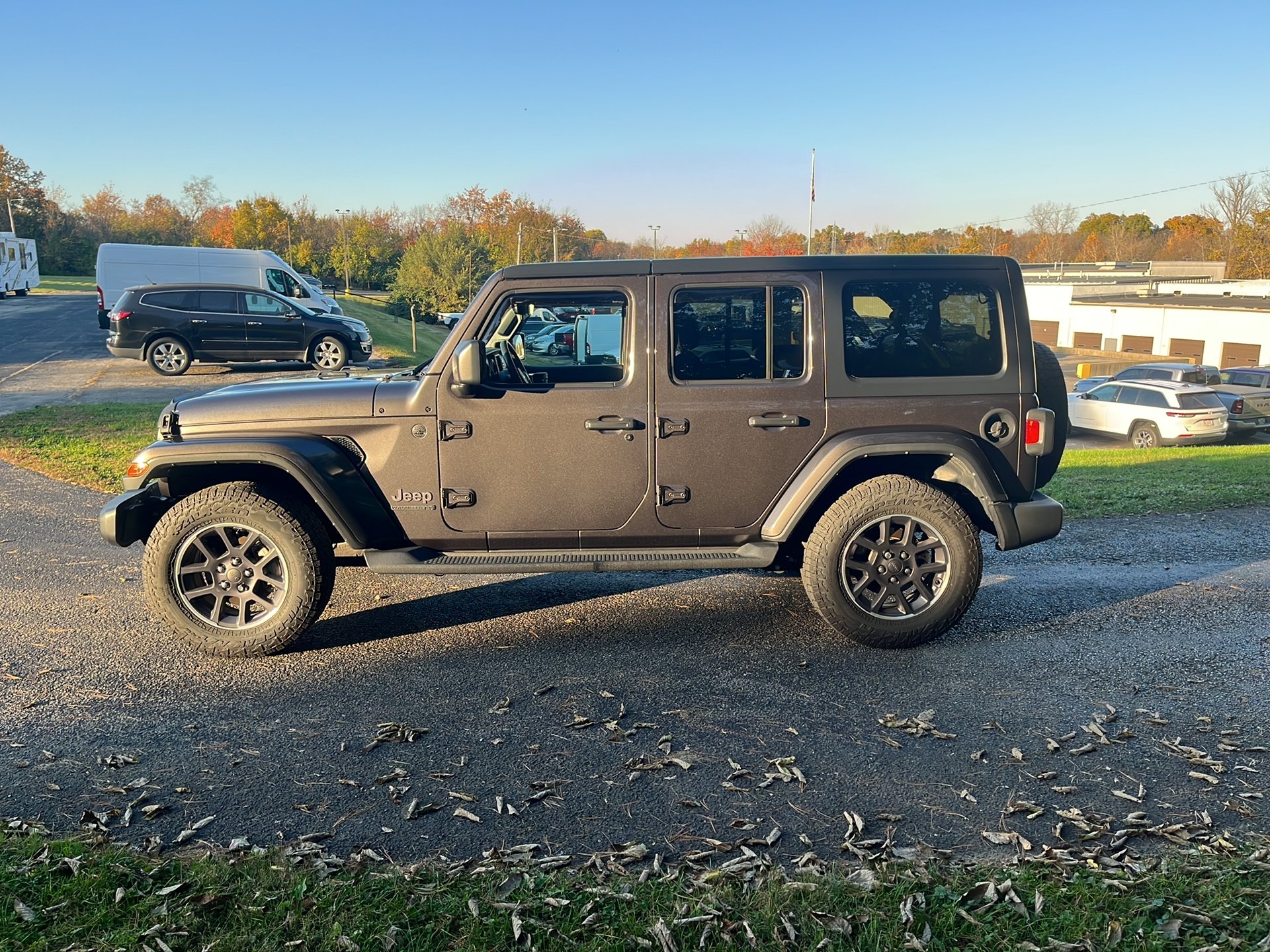 Used 2021 Granite Crystal Metallic Clear Coat Jeep Sport 80th Anniversary image 6