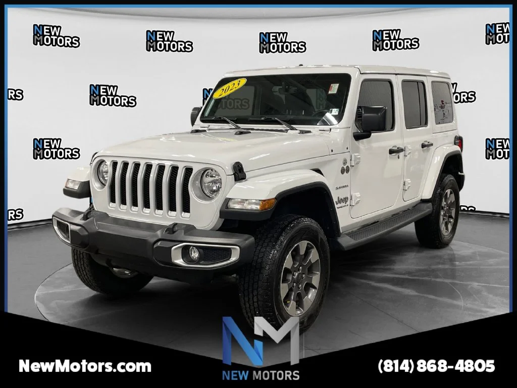 Used 2023 Bright White Clearcoat Jeep Sahara image 1
