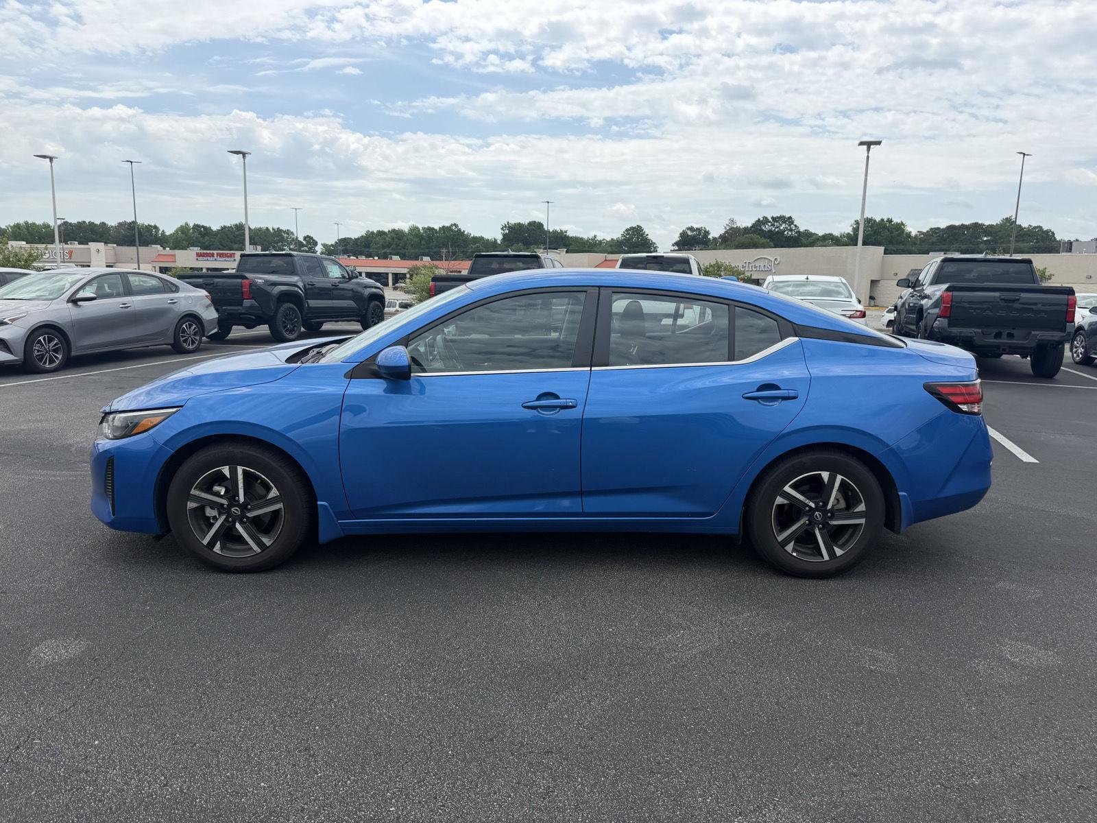 Used 2025 Electric Blue Metallic Nissan SV image 4