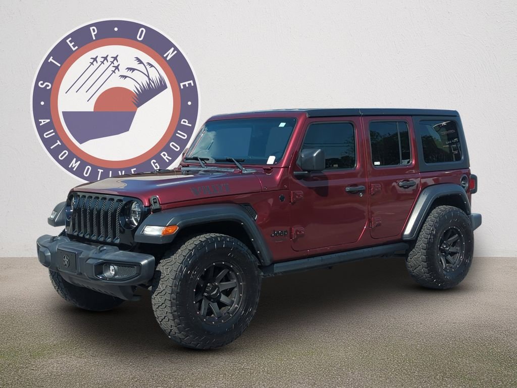 Used 2021 Red Jeep Unlimited Willys image 1