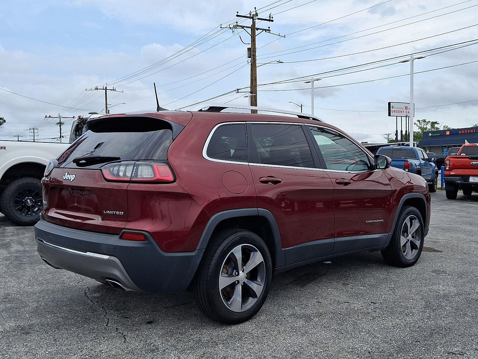 Used 2019 Velvet Red Pearlcoat Jeep Limited image 6