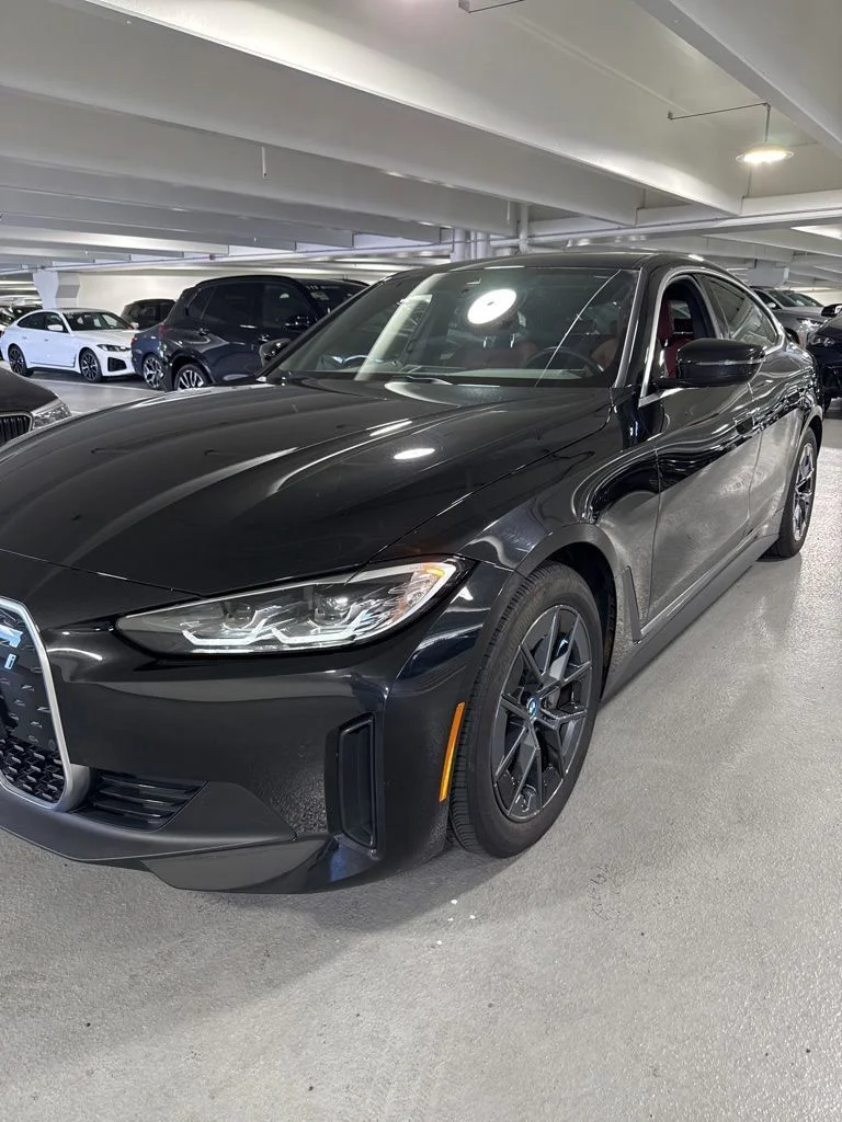 Used 2023 Black Sapphire Metallic BMW eDrive40 image 1