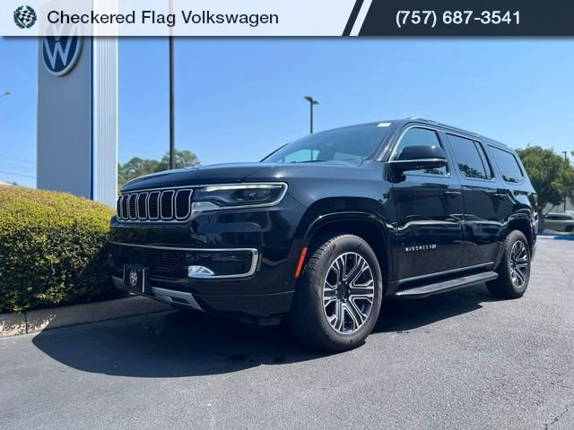 Used 2024 Diamond Black Crystal Pearlcoat Jeep Series II image 1