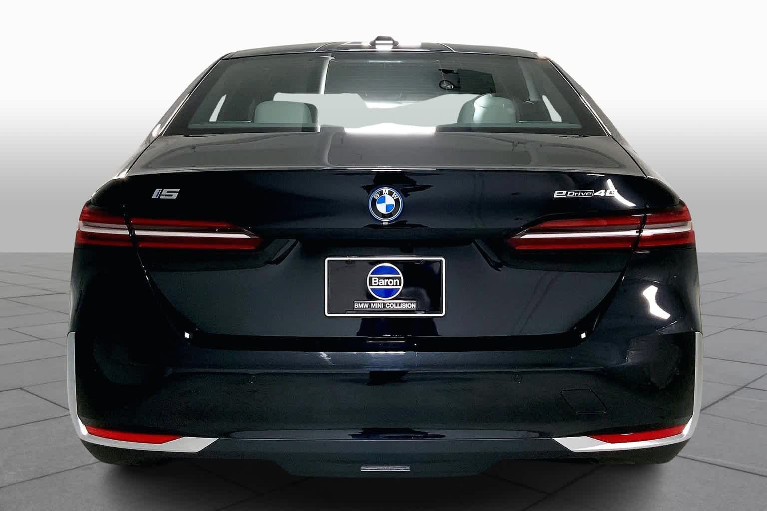 Used 2024 Black Sapphire Metallic BMW eDrive40 image 4