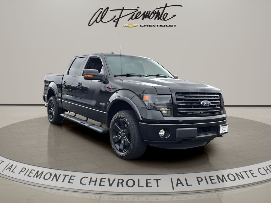 Used 2014 Black Ford FX4 image 1