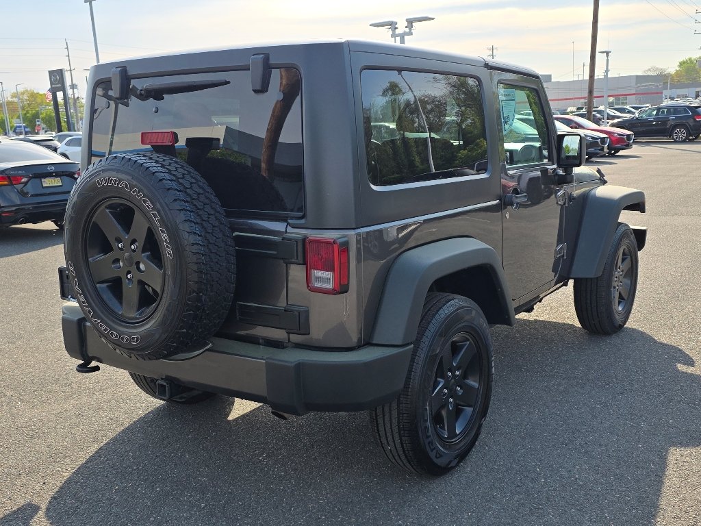 Used 2016 Granite Crystal Metallic Clear Coat Jeep Sport image 16
