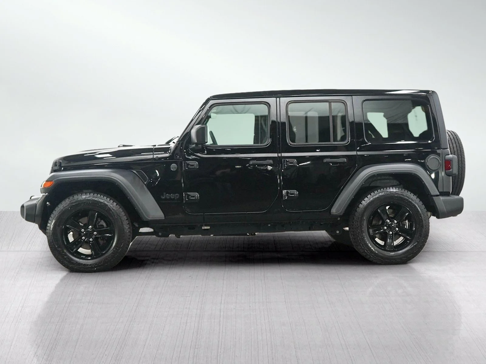 Used 2023 Jeep Wrangler 4-Door Altitude with VIN 1C4HJXDN8PW618950 for sale in Hopkins, Minnesota