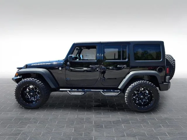 Used 2015 Black Jeep Unlimited Sport image 4