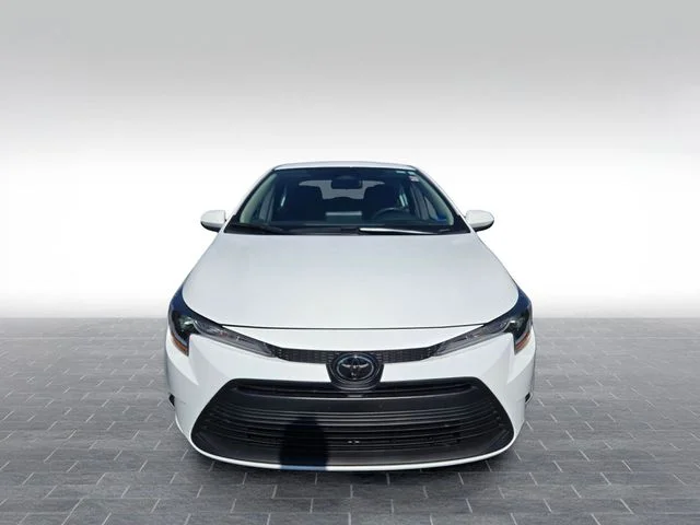 Used 2025 White Toyota LE image 2