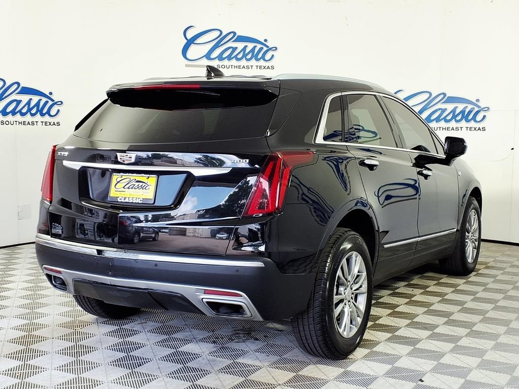 Used 2021 STELLAR BLACK METALLIC Cadillac FWD Premium Luxury image 6