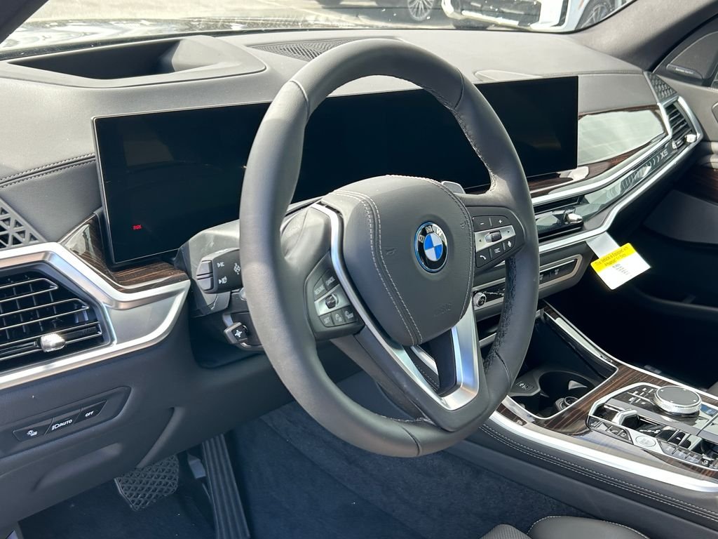 New 2026 Manhattan Green Metallic BMW xDrive50e image 13