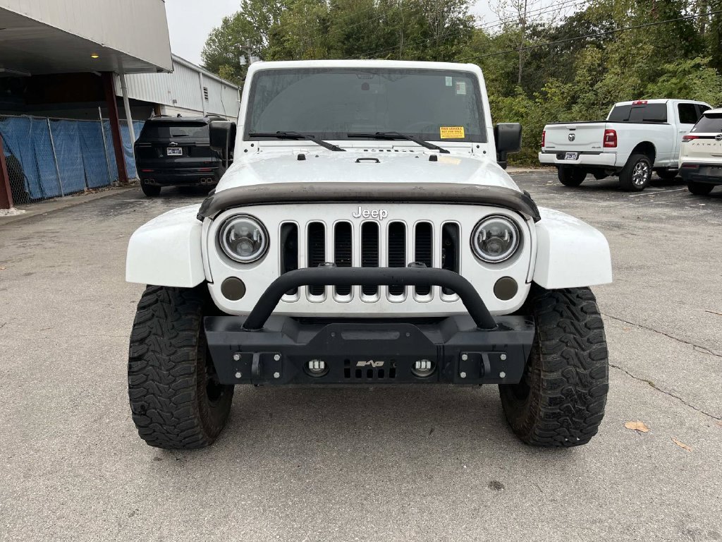 Used 2016 White Jeep Unlimited Sahara image 13