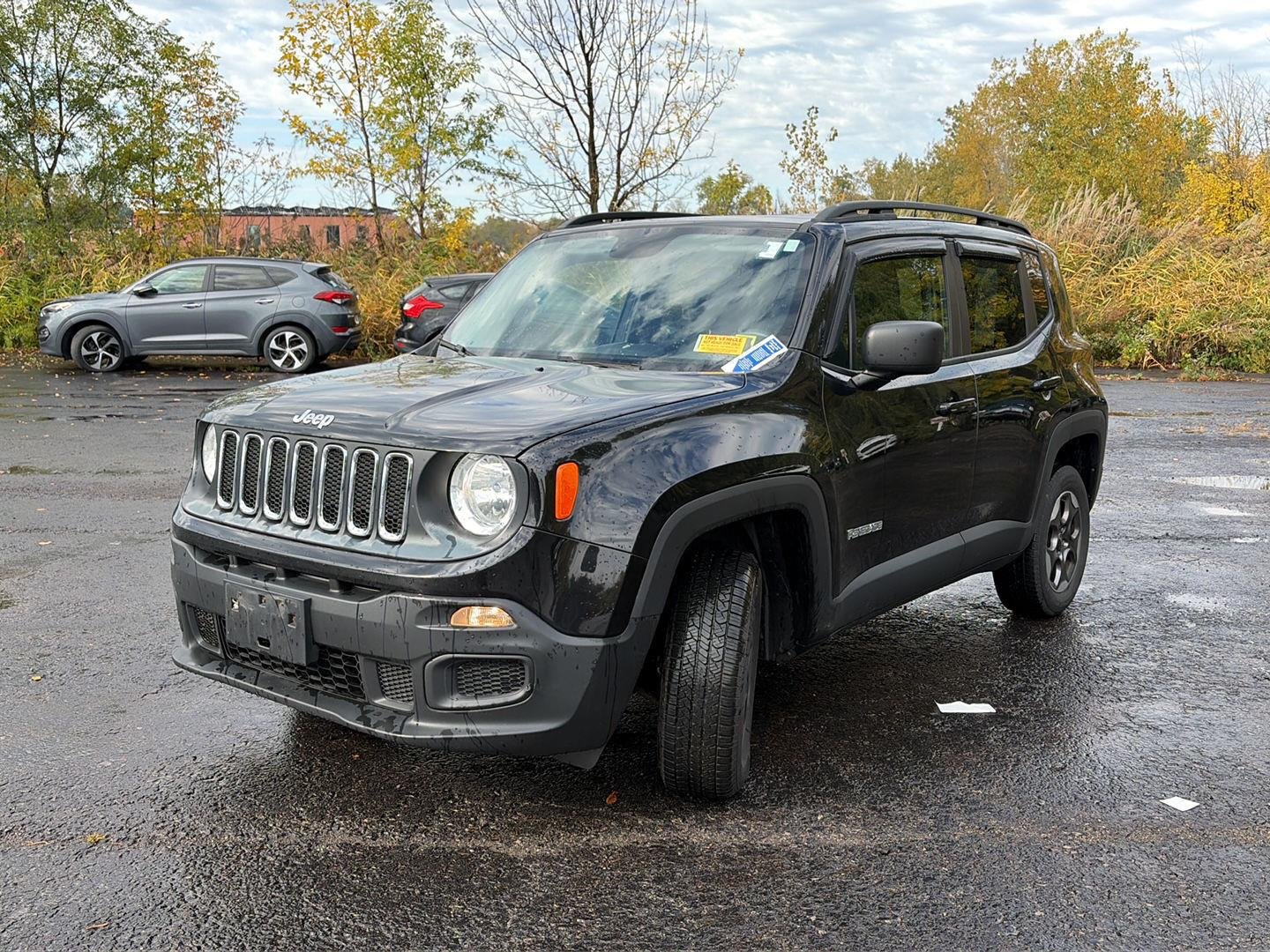 Used 2017 Black Jeep Sport image 2