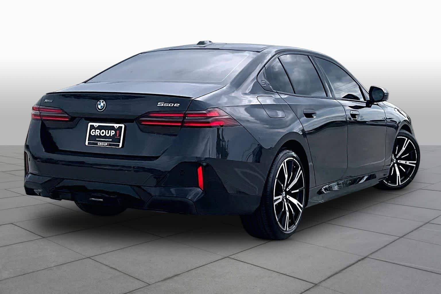 Used 2026 Dark Graphite Metallic BMW 550e xDrive image 12