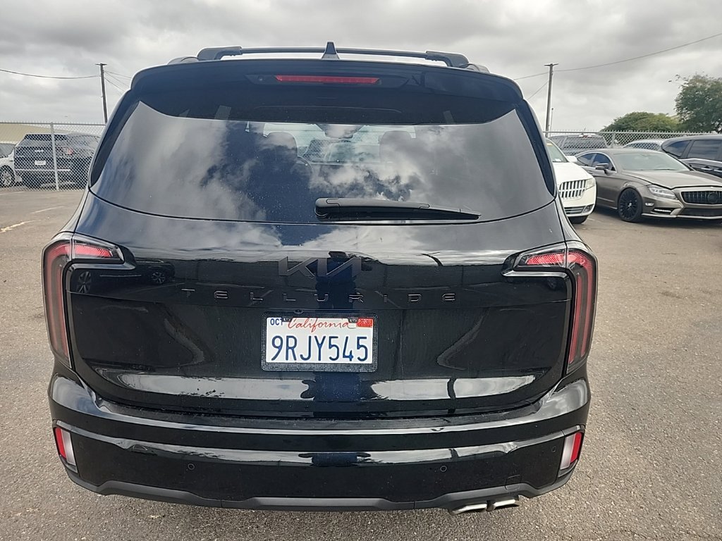 Used 2025 Black Kia SX-Prestige X-Line image 12