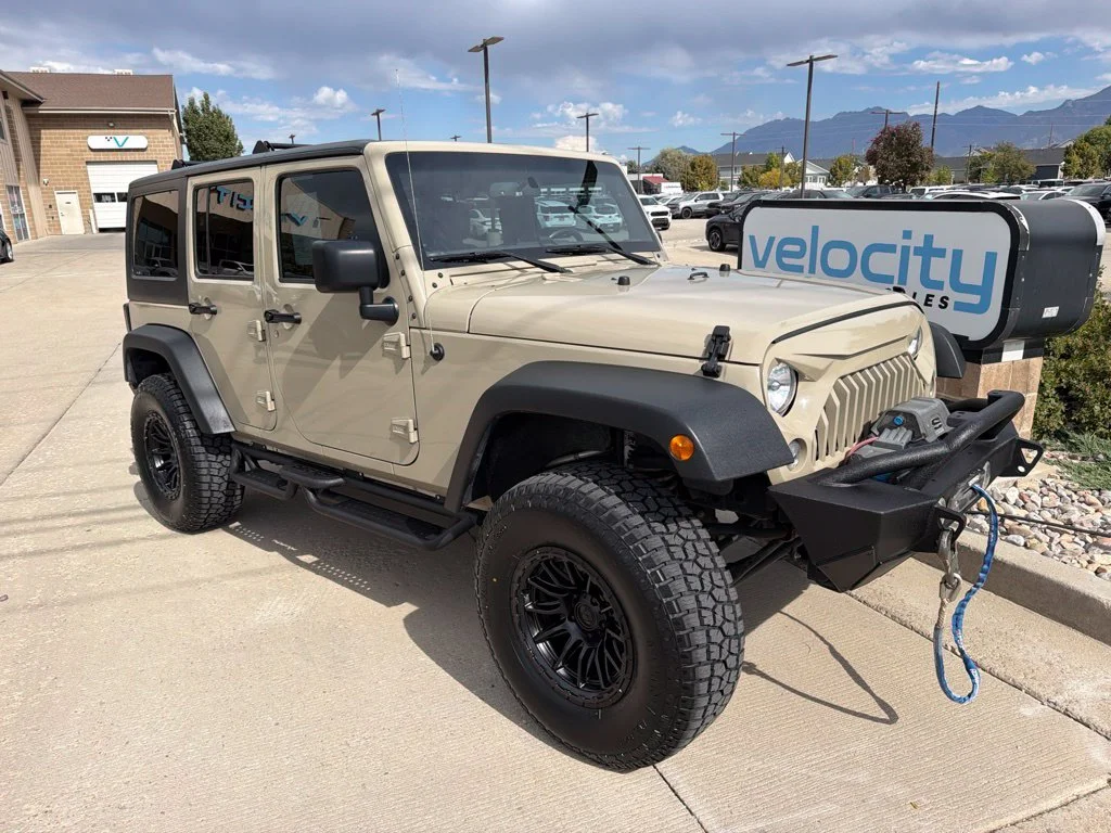 Used 2018 Beige Jeep Unlimited Sport image 1