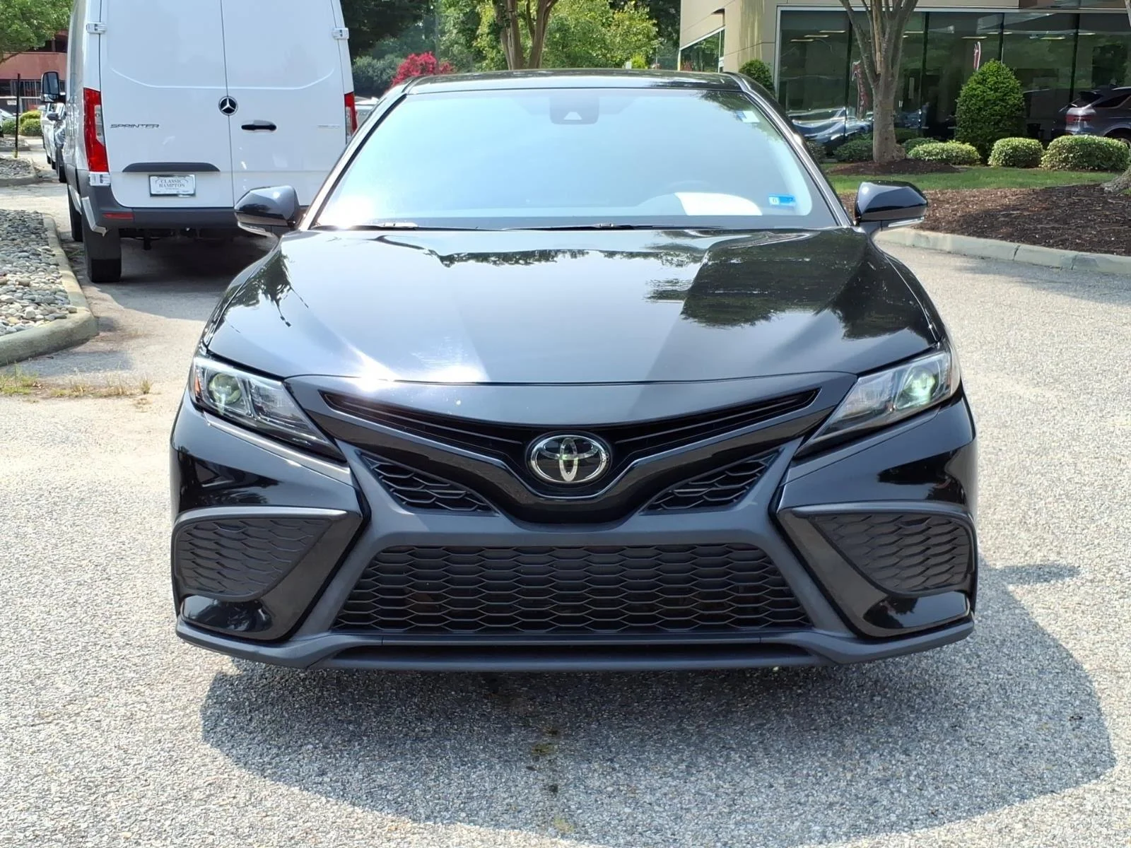 Used 2023 Midnight Black Metallic Toyota SE image 2