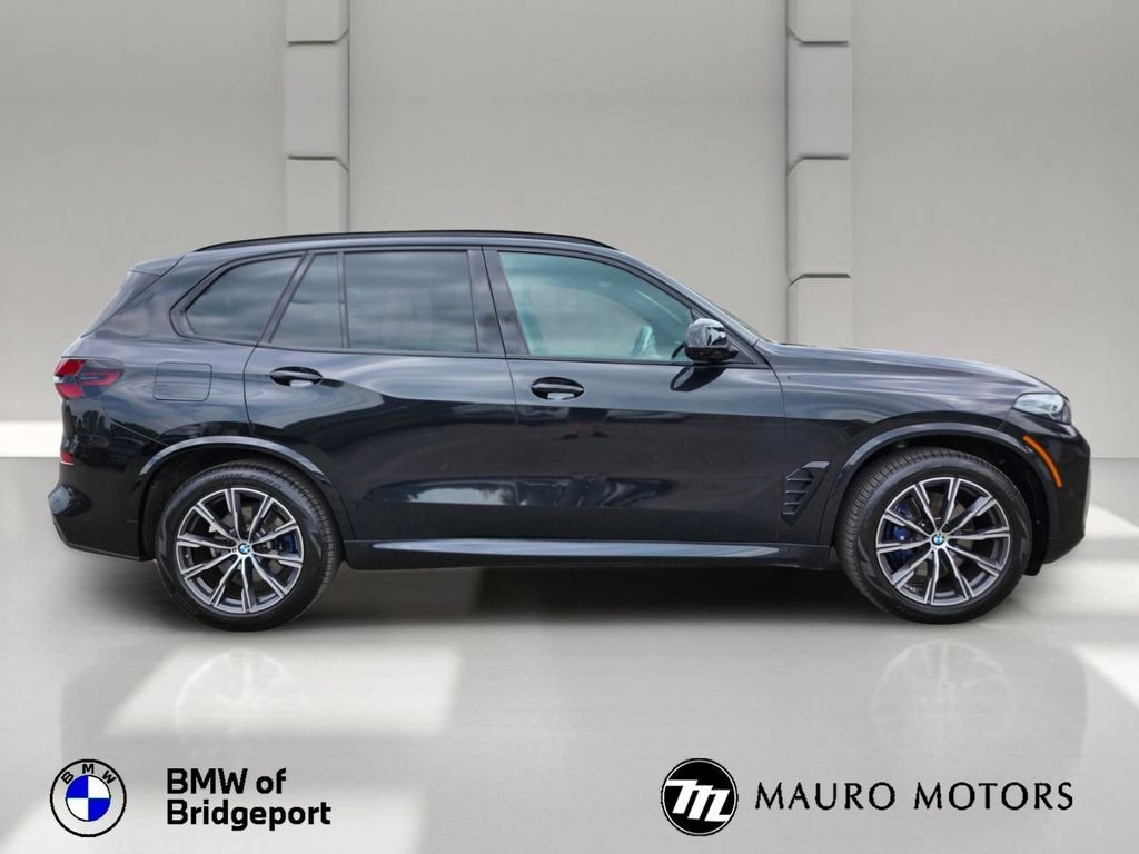 Used 2024 Black BMW xDrive40i image 2
