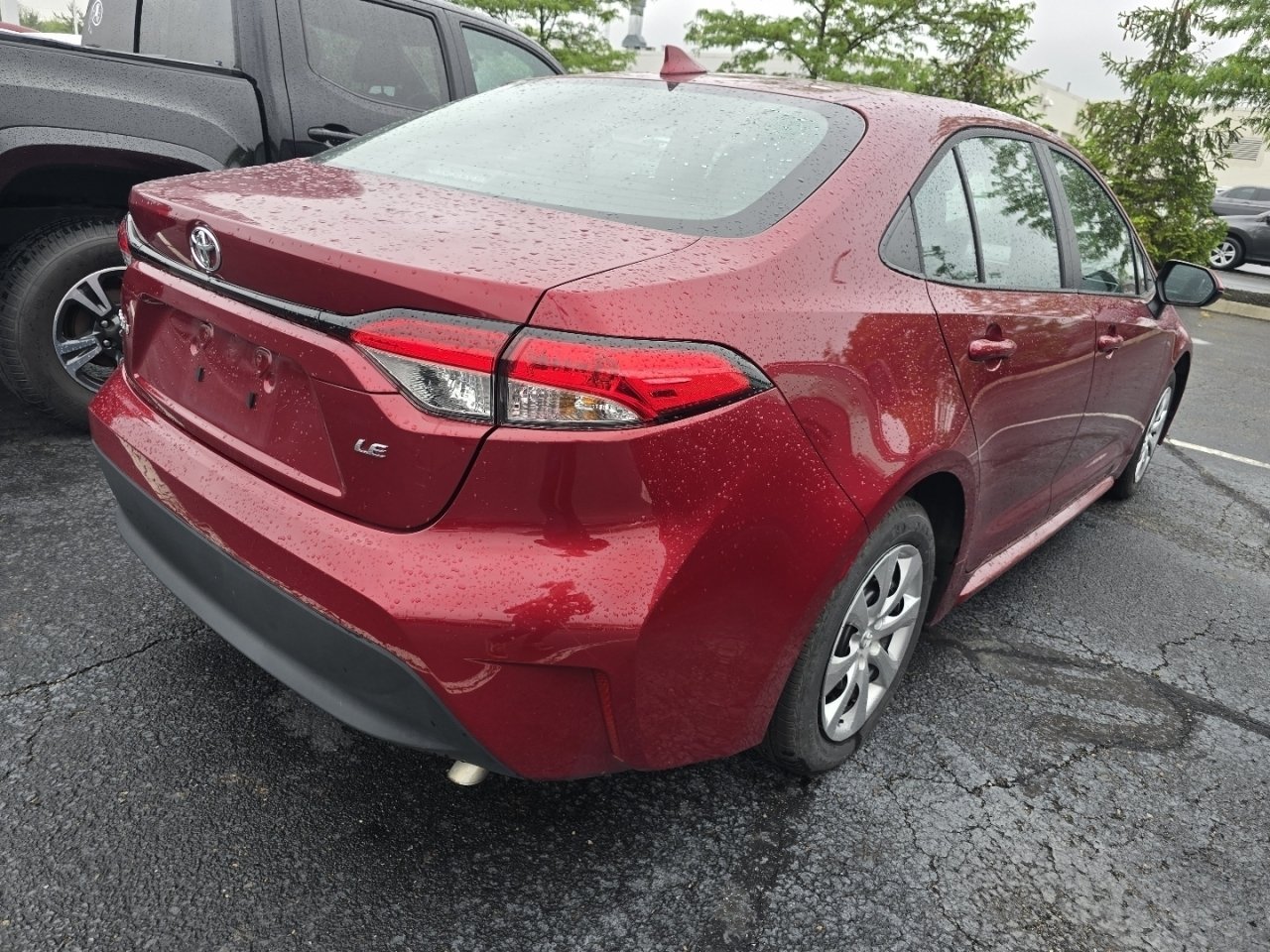 Certified Used 2025 Red Toyota LE image 7
