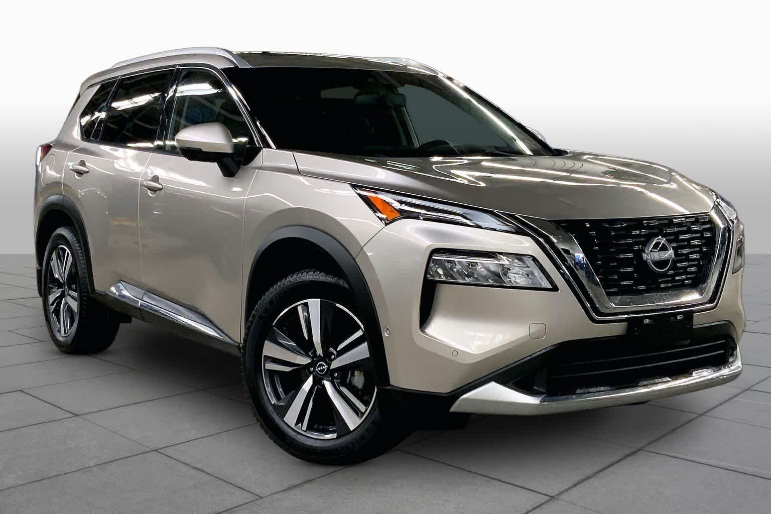 Used 2023 Champagne Silver Metallic Nissan Platinum image 3