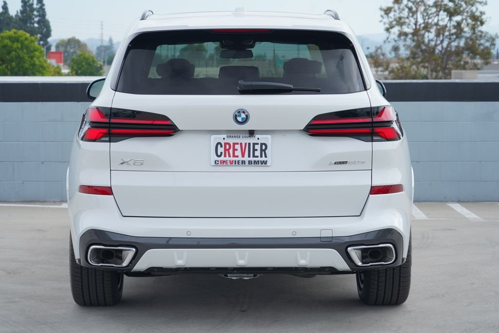 New 2026 Mineral White Metallic BMW xDrive50e image 7