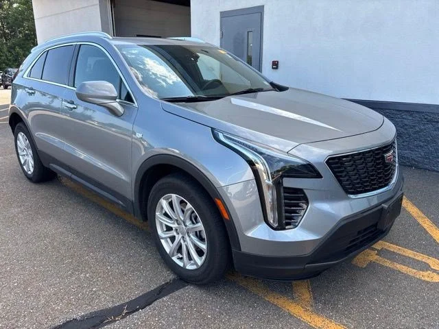 Used 2023 Argent Silver Metallic Cadillac AWD Luxury image 1
