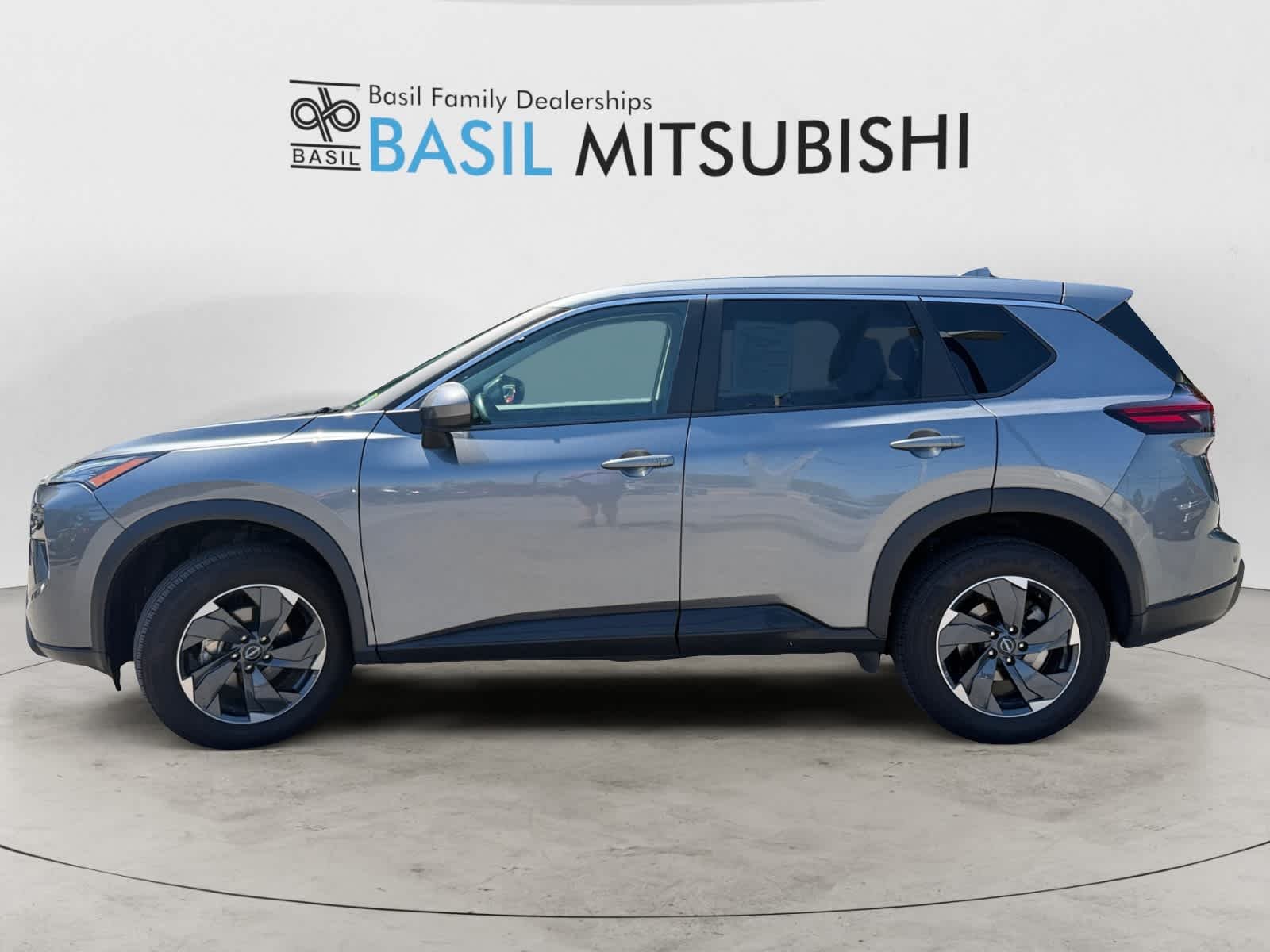 Used 2025 Gun Metallic Nissan SV image 2