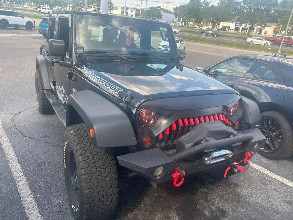 Used 2012 Black Jeep Sport image 9