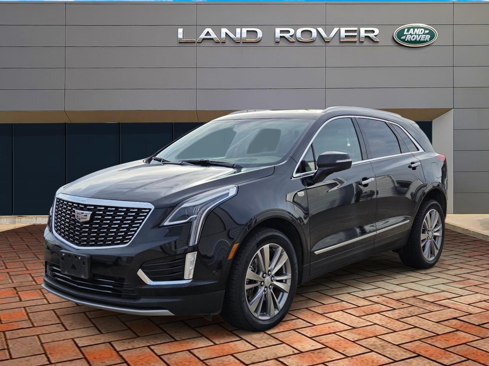 Used 2023 Stellar Black Metallic Cadillac AWD Premium Luxury image 1