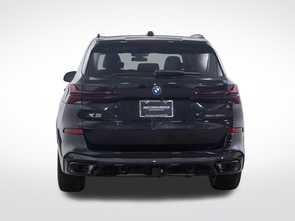 New 2026 Black Sapphire Metallic BMW xDrive50e image 4