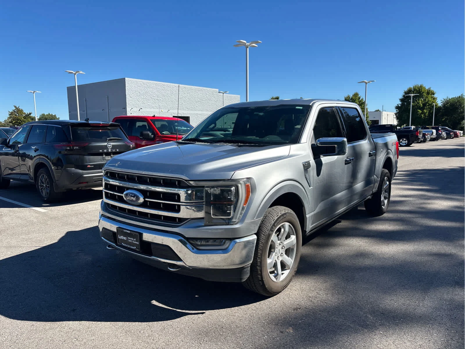 Used 2021 Ford F-150 Lariat with VIN 1FTFW1E89MFB62239 for sale in Kansas City