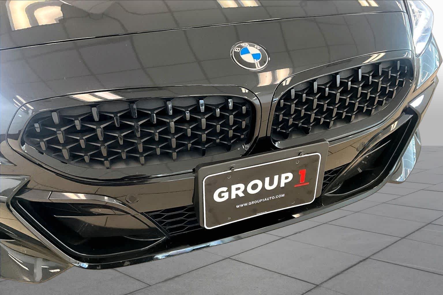 Used 2022 Black Sapphire Metallic BMW sDriveM40i image 25