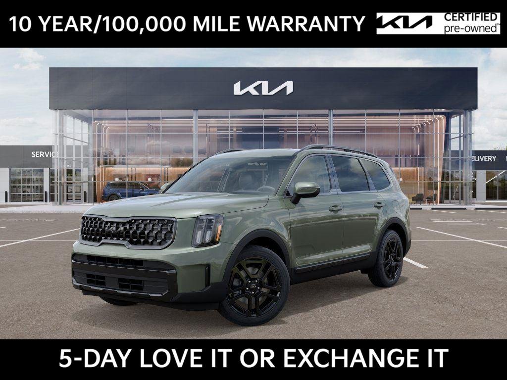 Used 2025 Jungle Green Kia EX X-Line image 1