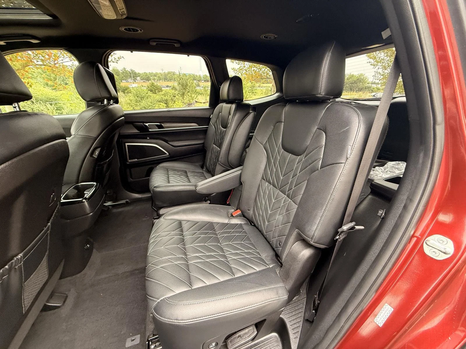 Used 2024 Dawning Red Kia EX X-Line image 17