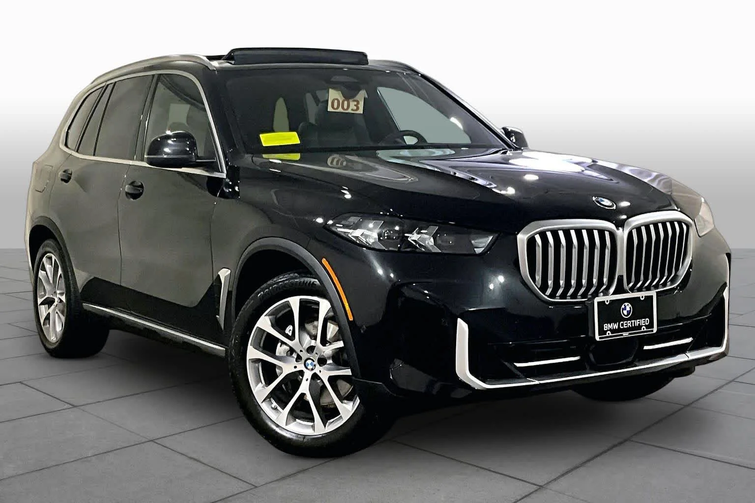Certified Used 2024 Black Sapphire Metallic BMW xDrive40i image 2