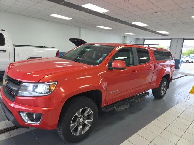 Used 2016 Orange Metallic Chevrolet Z71 image 1