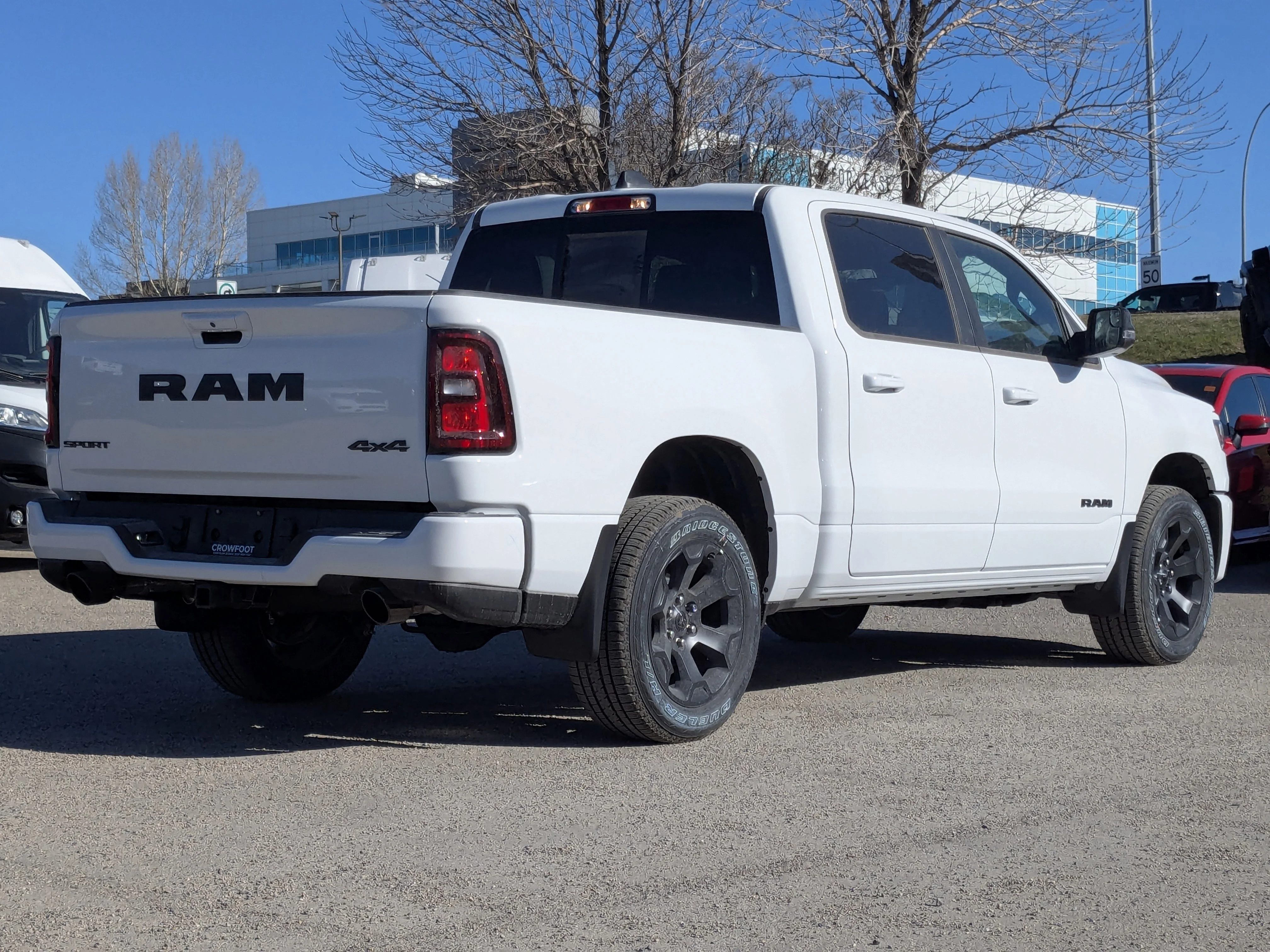 New 2026 White RAM Sport - - Pkg 21L - Pano Sunroof - Sport Hood - Trailer Brake Ctrl & More image 8