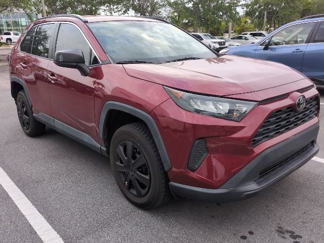 Used 2020 Pearl Toyota LE image 1
