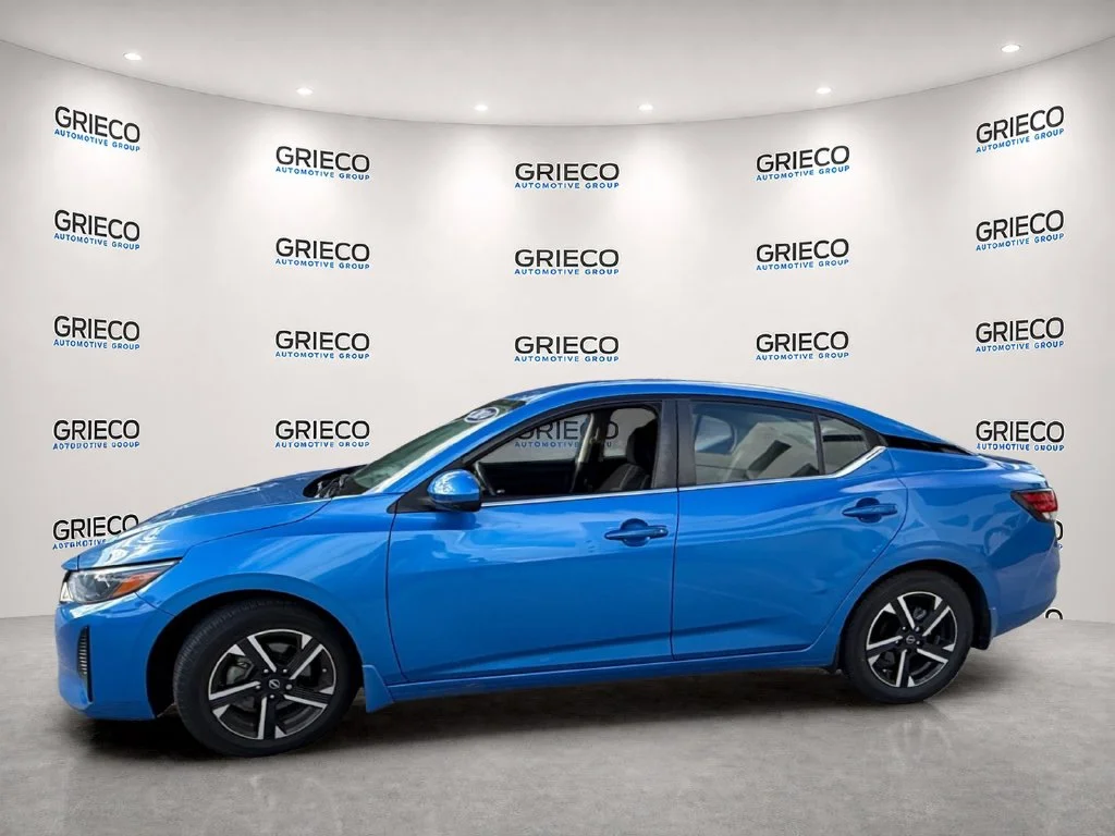 Used 2024 Electric Blue Metallic Nissan SV image 4