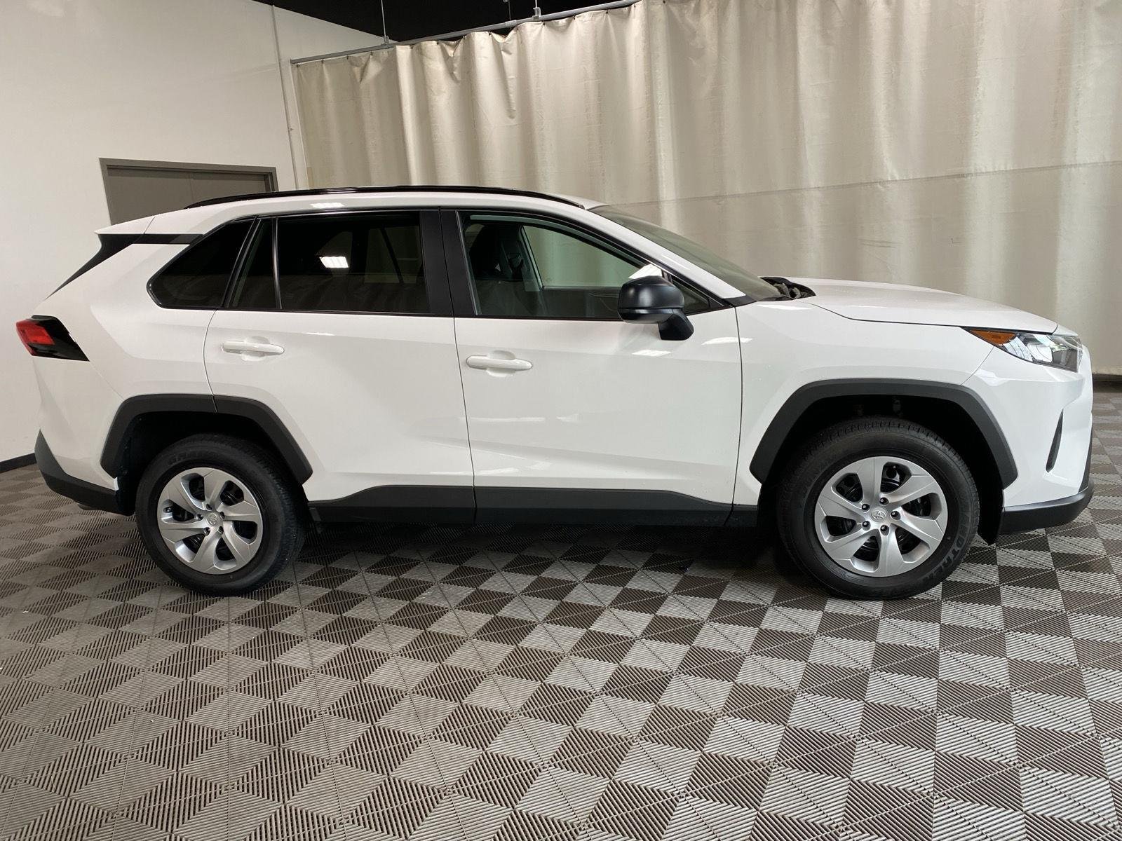 Used 2021 Super White Toyota LE image 8