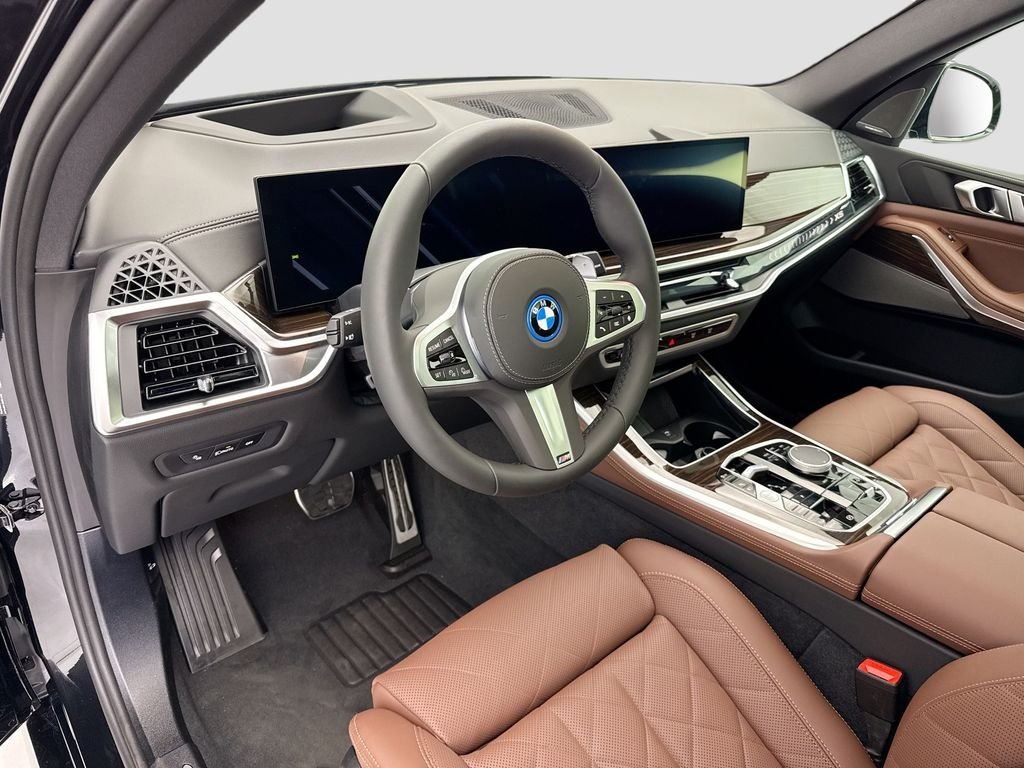 New 2026 Black Sapphire Metallic BMW xDrive50e image 9