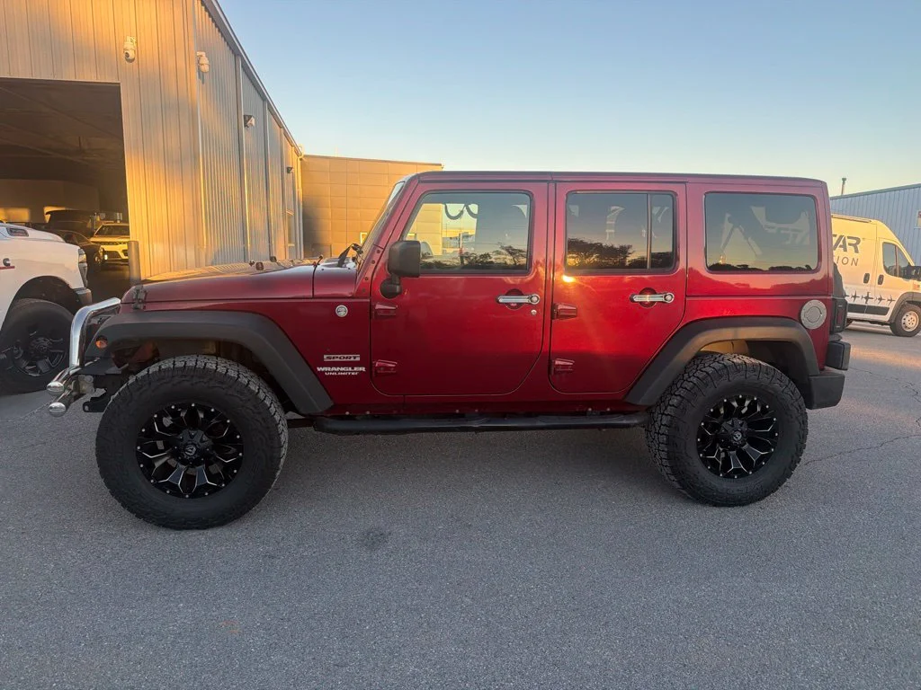 Used 2012 Red Jeep Unlimited Sport S image 7