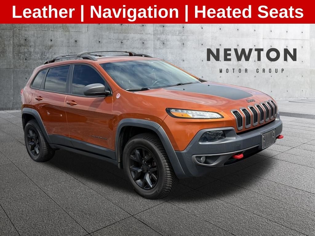 Used 2016 Orange Jeep Trailhawk image 1