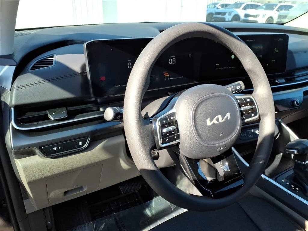 New 2026 Deep Chroma Blue Kia LX image 16