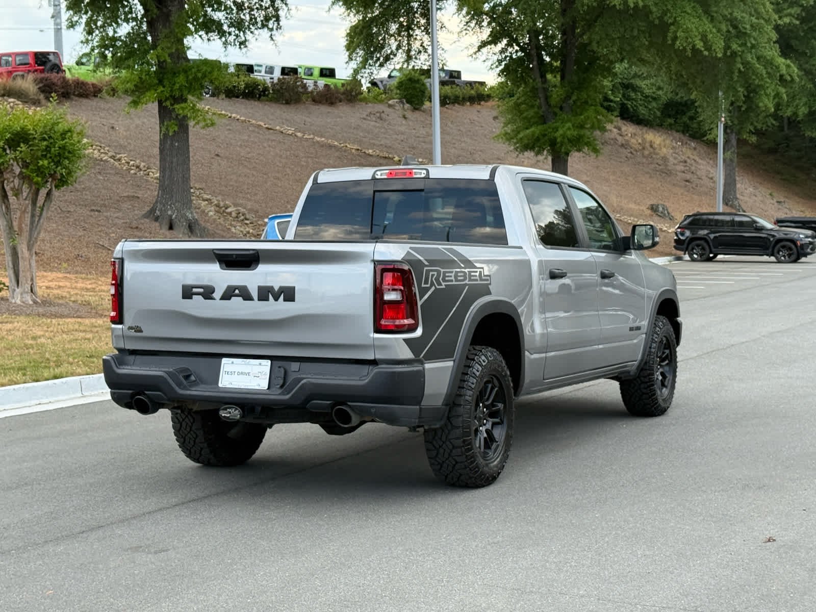 Used 2025 Billet Silver Metallic Clearcoat Ram Rebel image 5