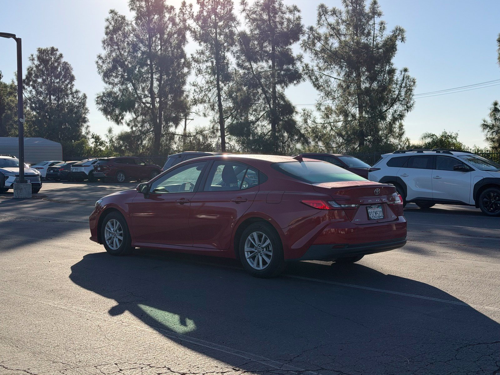 Certified Used 2025 Red Toyota LE image 3