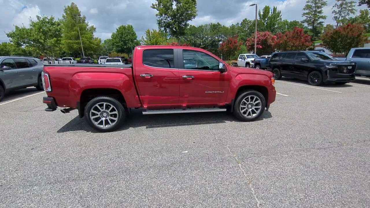 Used 2021 CAYENNE RED TINTCOAT GMC 2WD Denali image 9